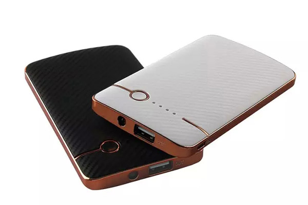 Mobile phone power bank with carbon fiber cover